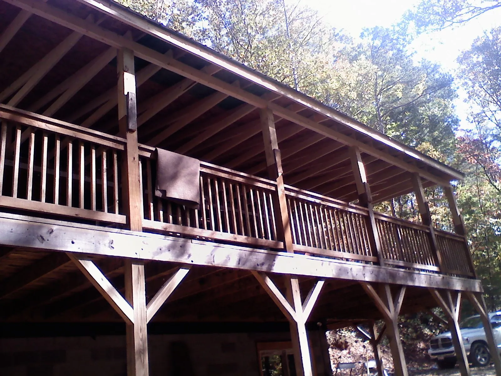 Timber framing under a new elevated porch and deck — Roof Leak Repair in Lee by Roofing Brothers